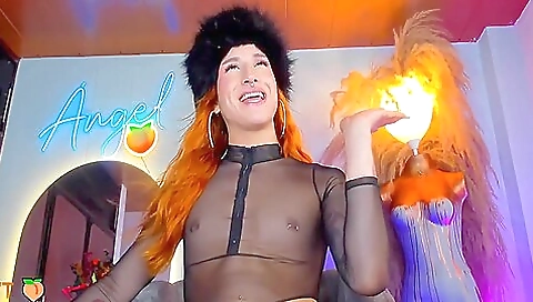 Redheaded beauty with a nice ass seduces her big cock